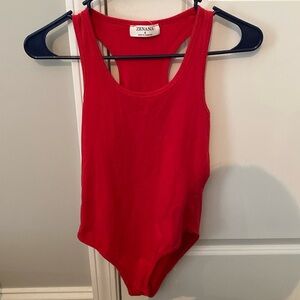 Red body suit with button clasps